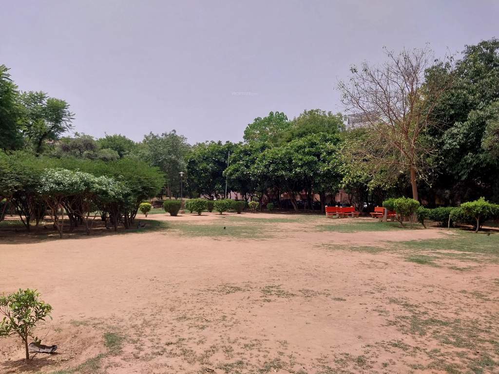  pink town house Landscaped Gardens