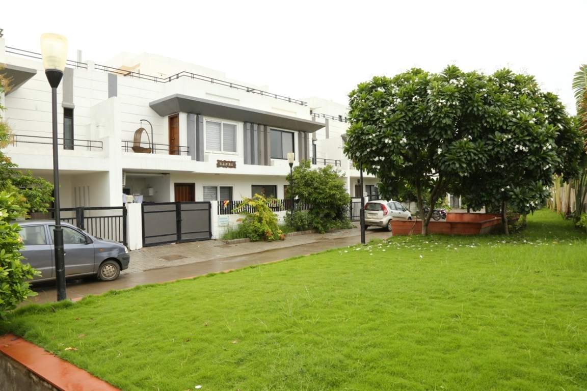  seasons of joy apartment Landscaped Gardens