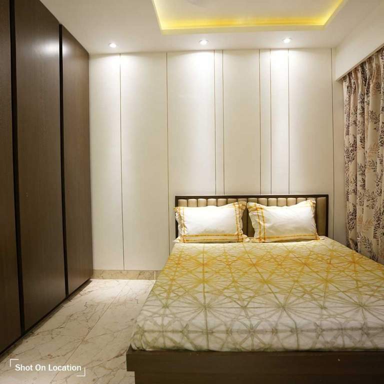  vedant millenia happiness phase ii wing a Bedroom