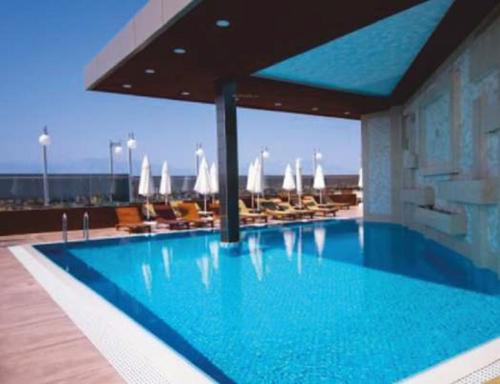  sanjanas-courtyard-club-house Swimming Pool