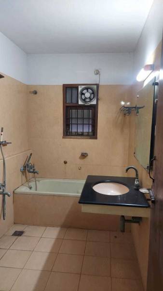  manonmaniam-apartment Bathroom