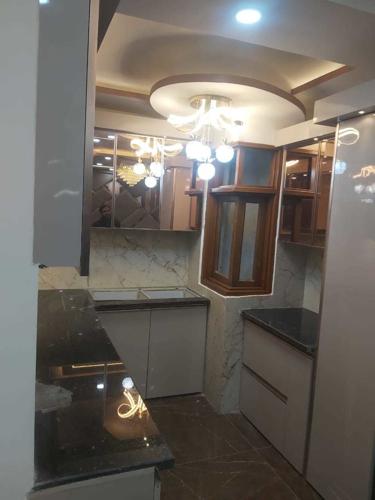 Kitchen shantiniketan-by-aggarwal-associates-and-builders Kitchen