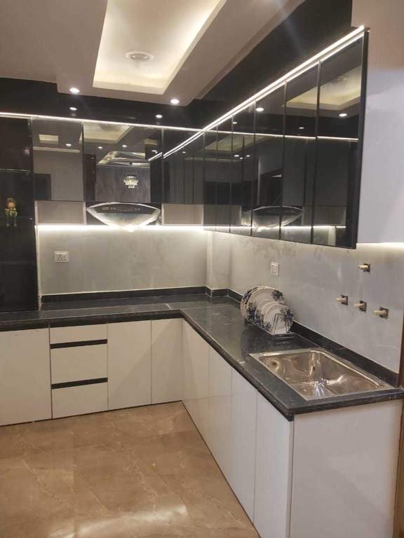 shantiniketan by aggarwal associates and builders Kitchen