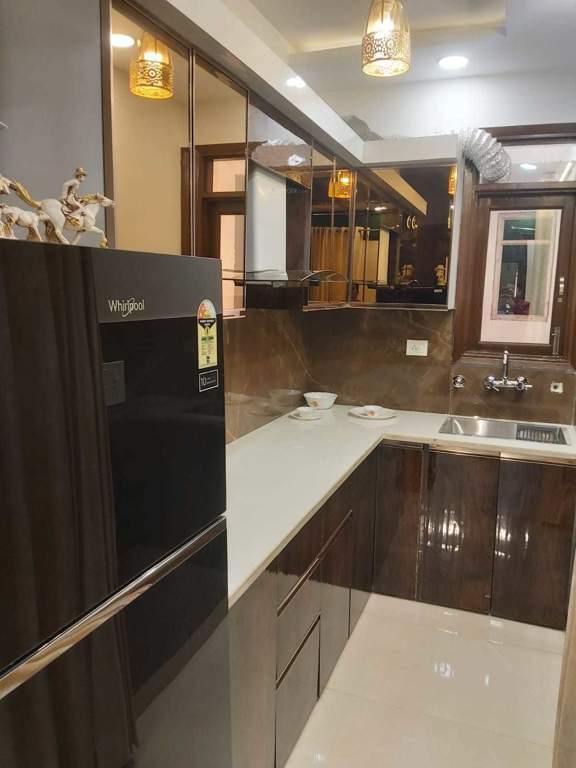 shantiniketan by aggarwal associates and builders Kitchen