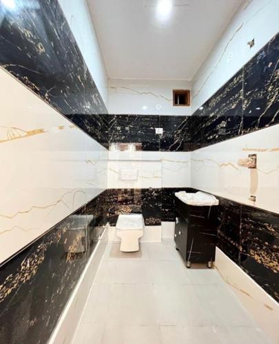 Bathroom the-apna-ghar-by-g3-buildtech-dwarka-mor Bathroom