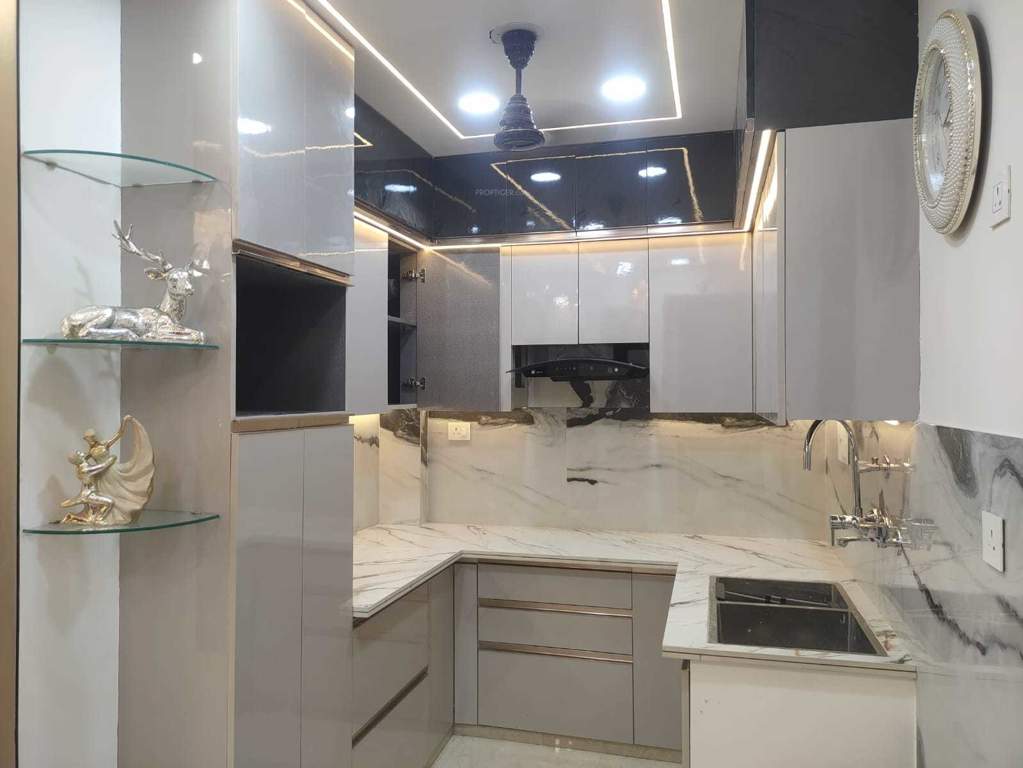 affordable floors by shubharambh builders Kitchen