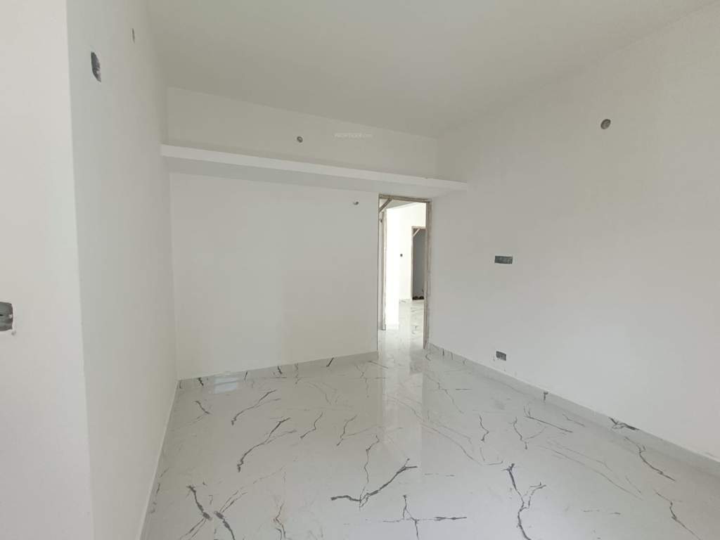  janani dhanalakshmi Bedroom