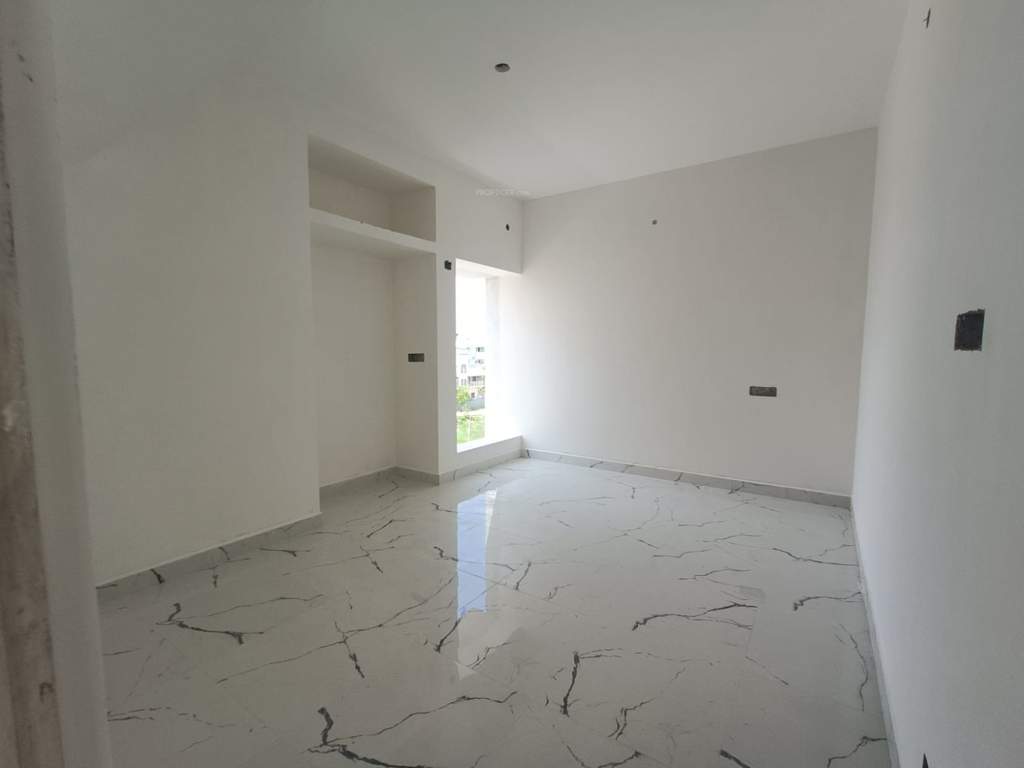  janani dhanalakshmi Bedroom