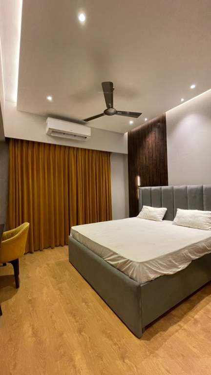  krishna orchid studio apartments Bedroom