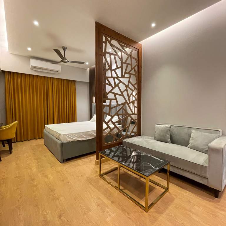  krishna orchid studio apartments Bedroom