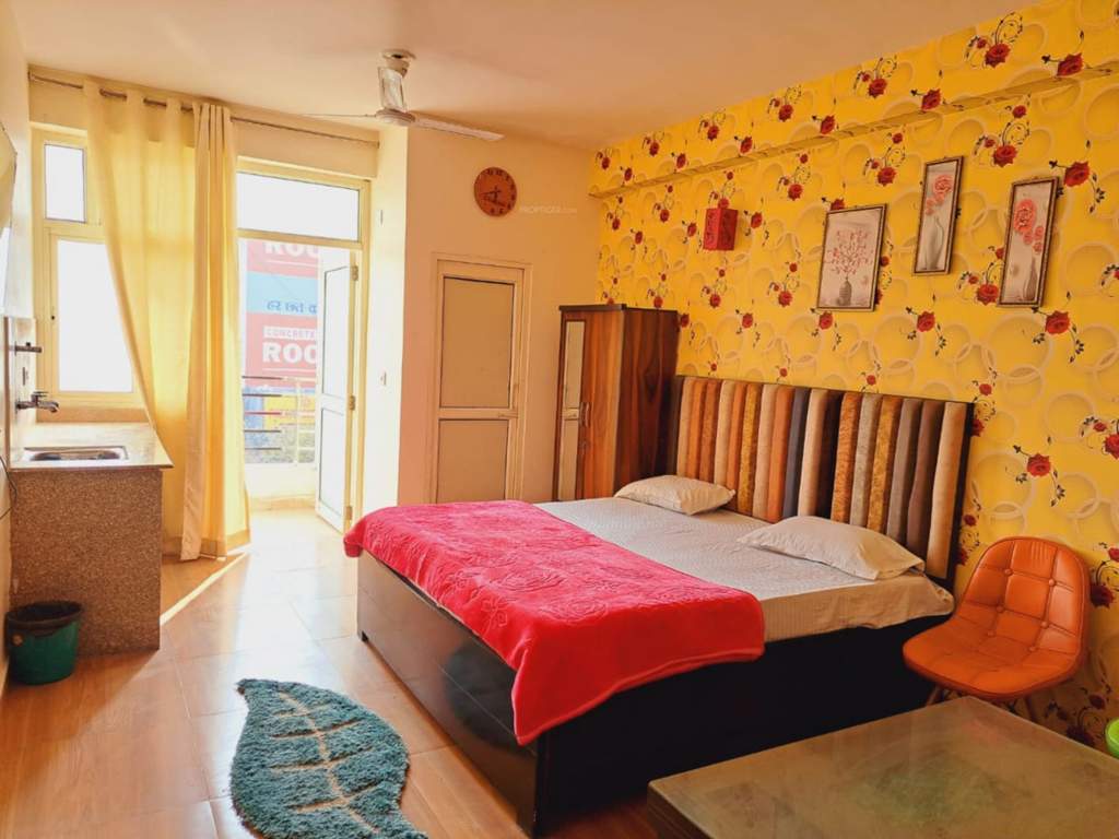  krishna orchid studio apartments Bedroom