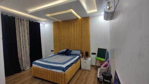 Bedroom green-beauty-farm-house Bedroom