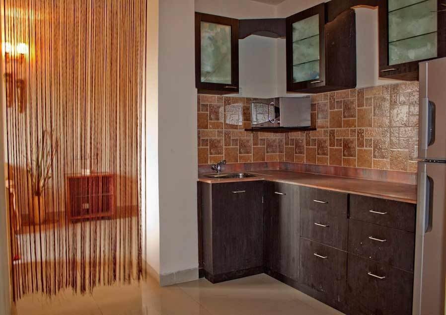  susheila apartments Kitchen