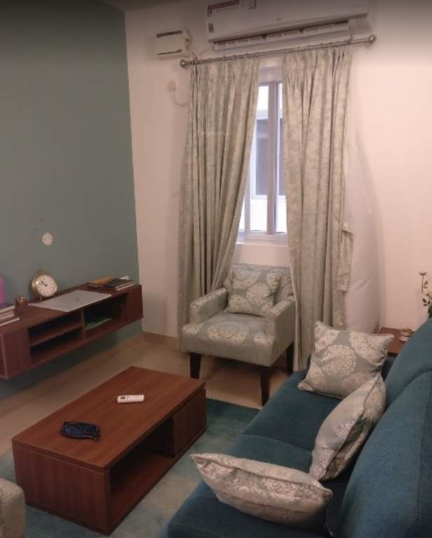  tvs emerald greenacres Living Area